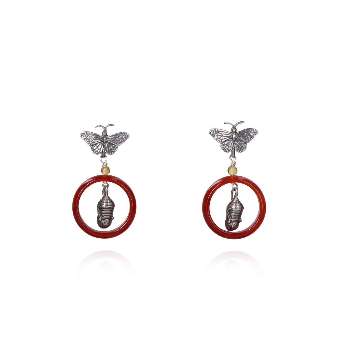 Monarch butterfly and cocoon earrings.