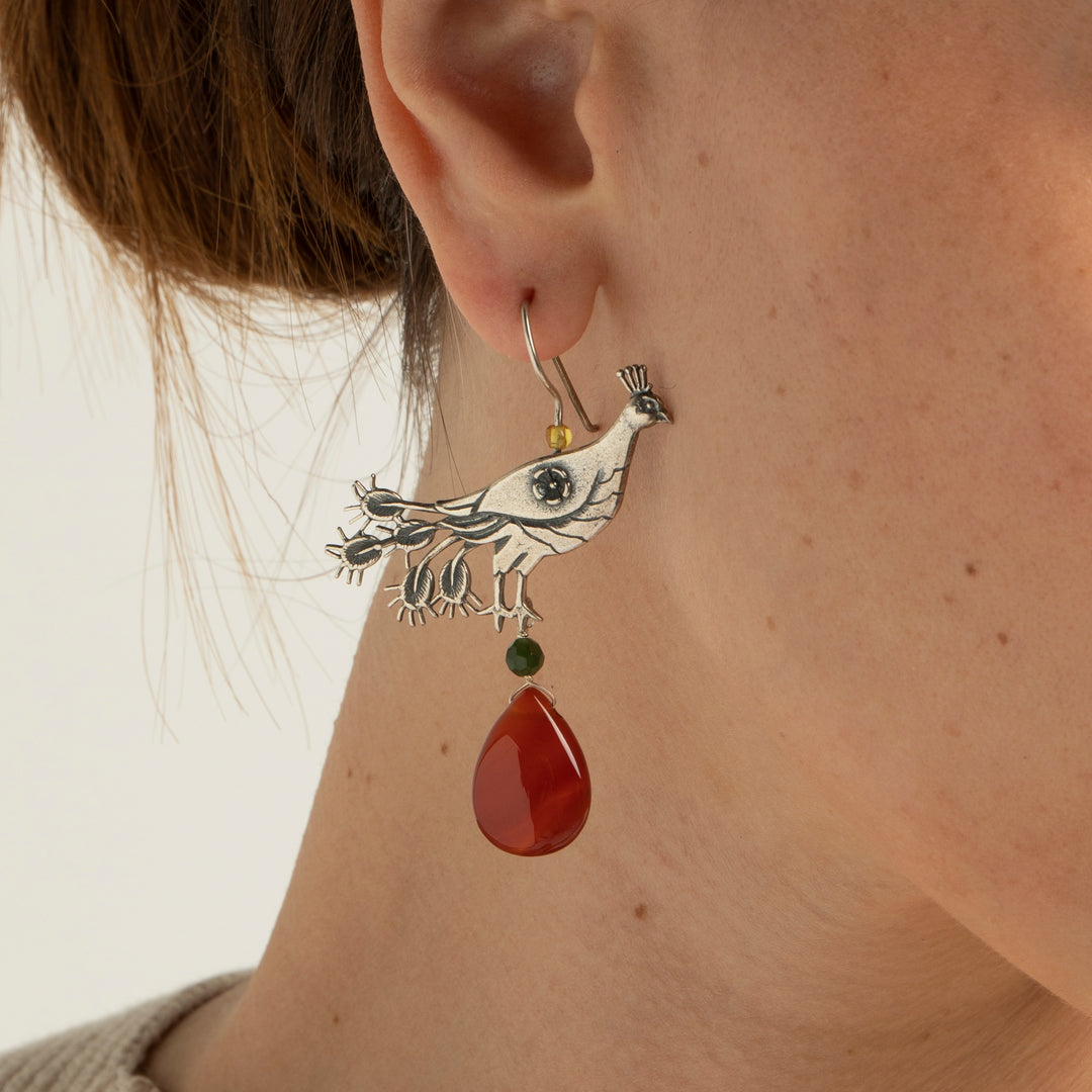 Aretes pavo real gde. llanura