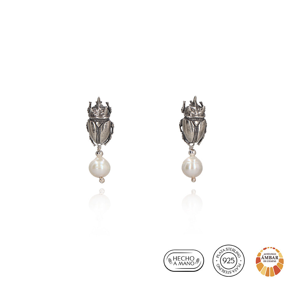 Renacer escarabajo con perla