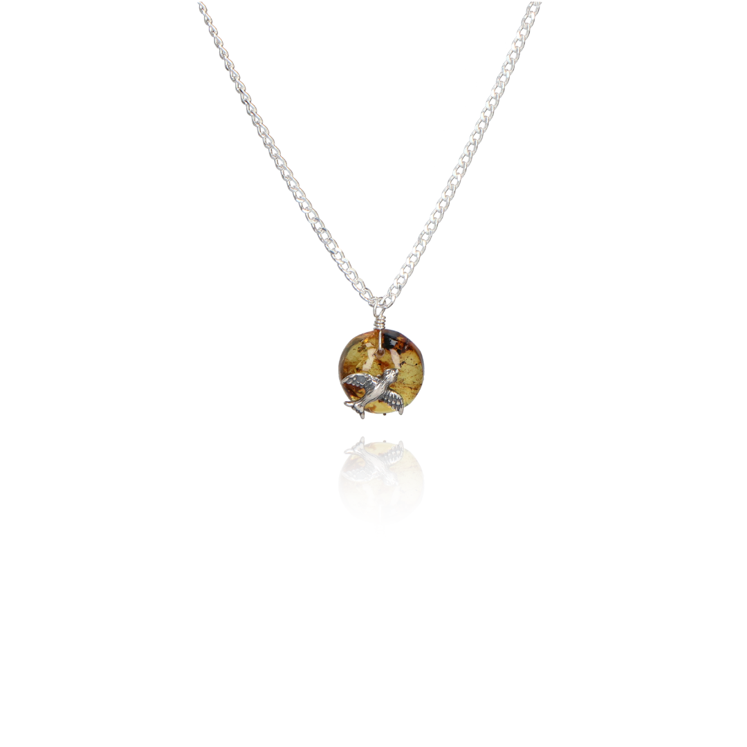 Swallow choker on amber