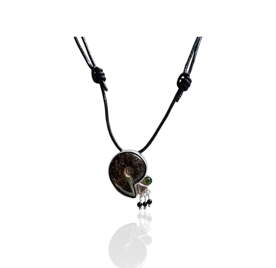 Small fossilized snail pendant