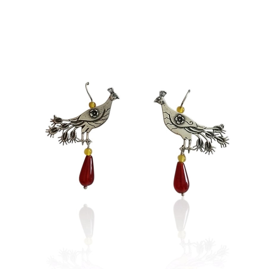 Aretes pavo real gde. llanura