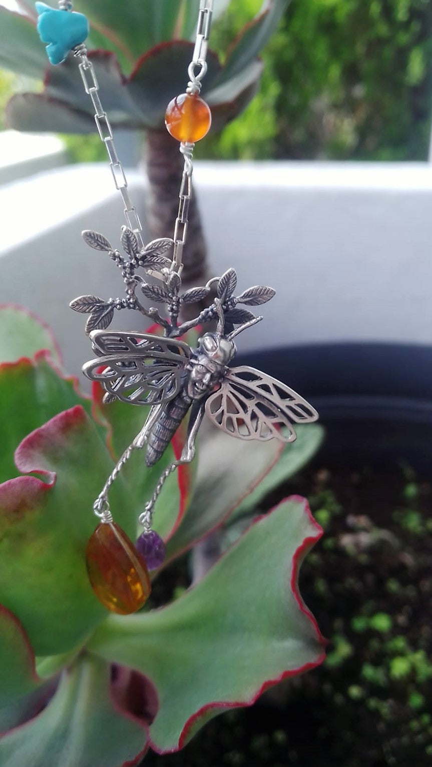 Grasshopper on Branch Choker