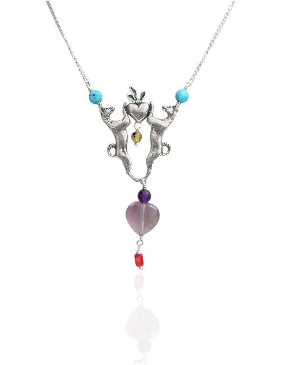 Xoloescuincles choker holding a heart