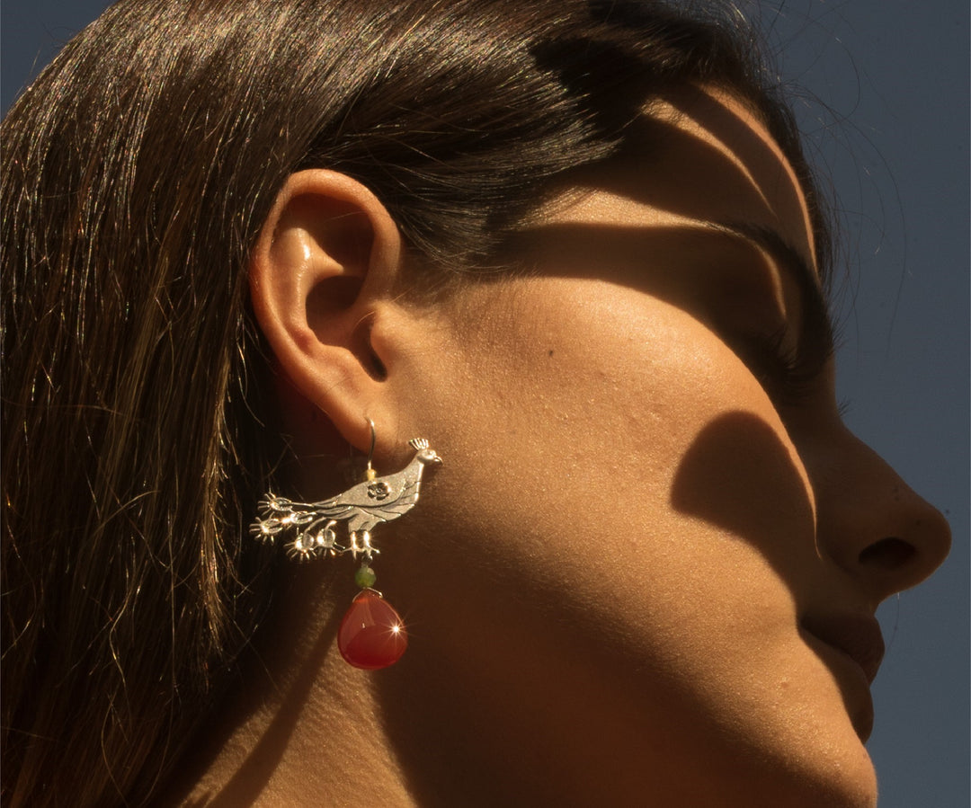 Aretes pavo real gde. llanura