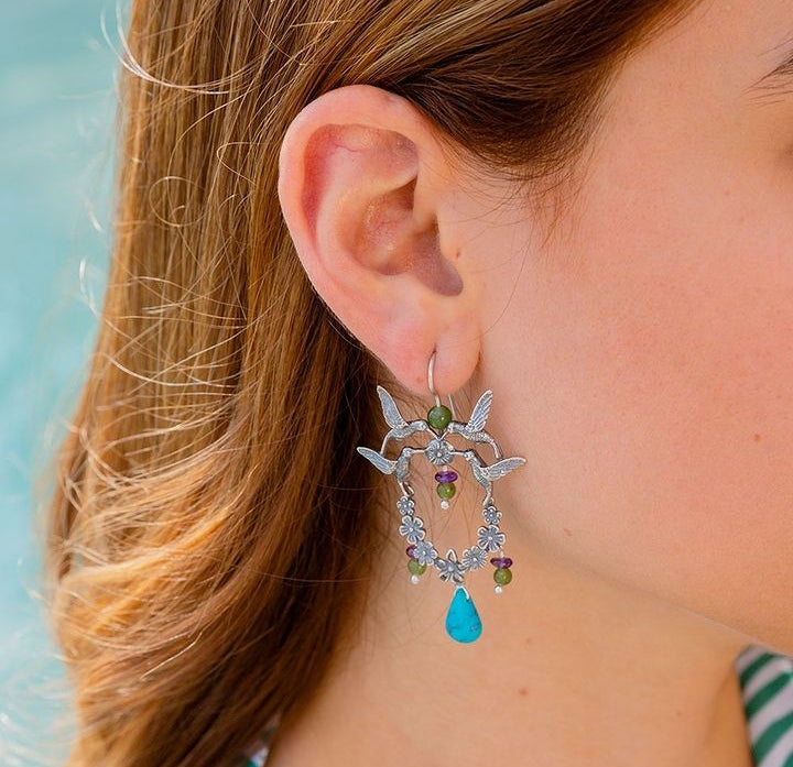 Aretes picaflor corona flores